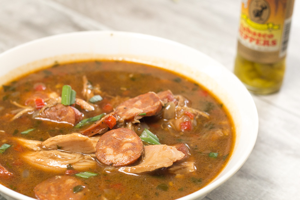 Delicious chicken and sausage gumbo anyone can make. It all starts with a flawless oven roux and ends with chicken and sausage gumbo goodness!